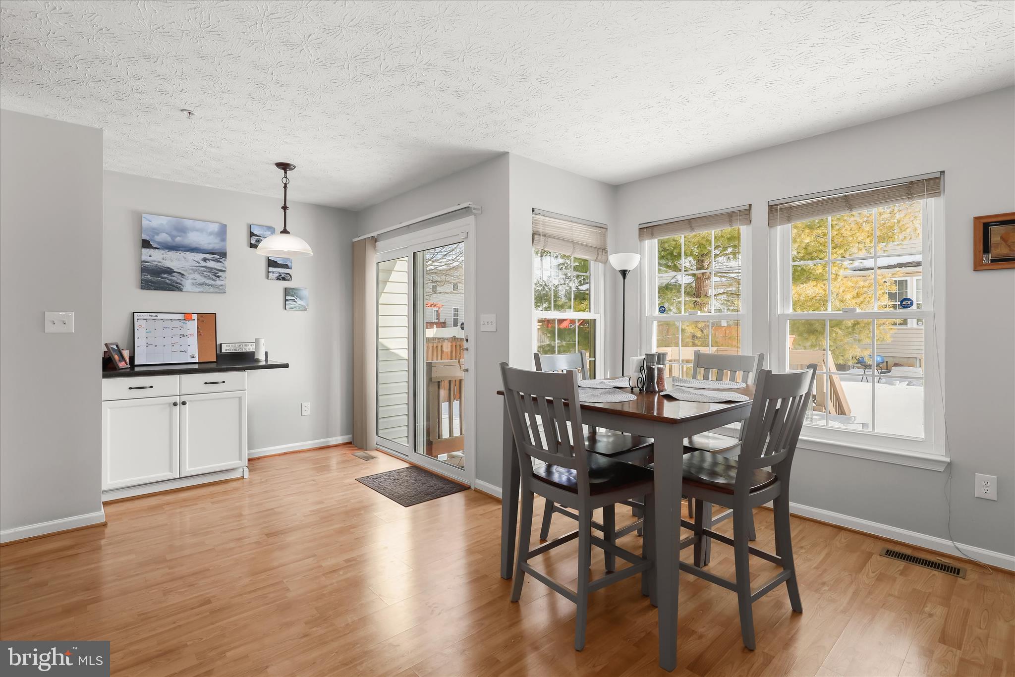 2019 Amber Way Baltimore, MD 21244 - Photo 9 of 27 a view of a dining room with furniture window and wooden floor