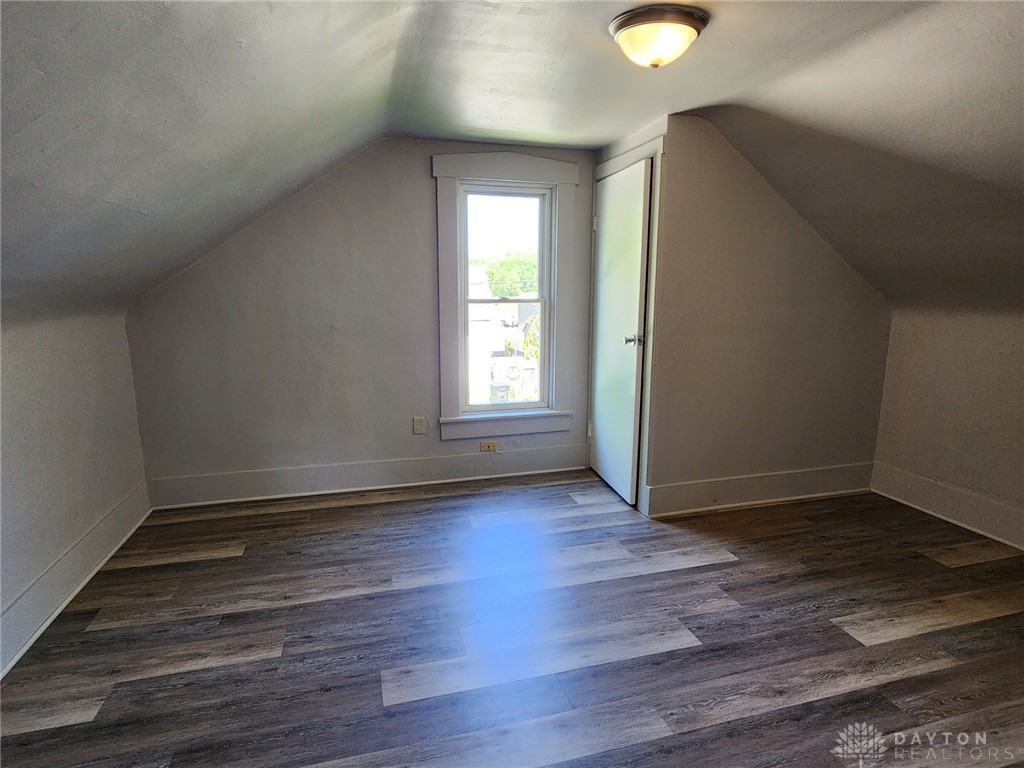 211 Race Street Spring Valley, OH 45370 - Photo 11 of 12 This versatile attic space features durable vinyl plank flooring, ready for your creative vision.