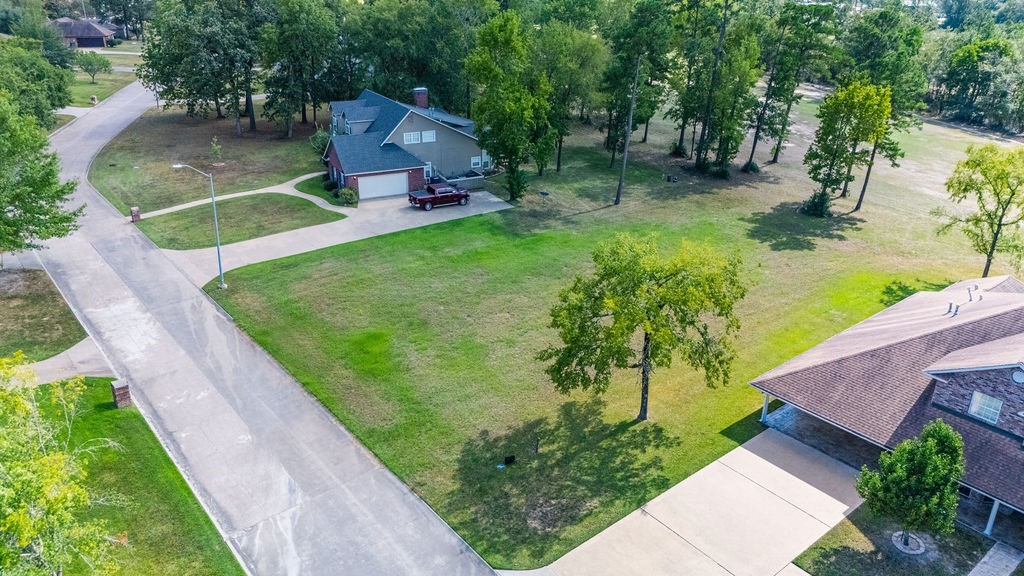 916 Dogwood Ridge Drive Diboll, TX 75941 - Photo 2 of 15 an aerial view of a house with a yard