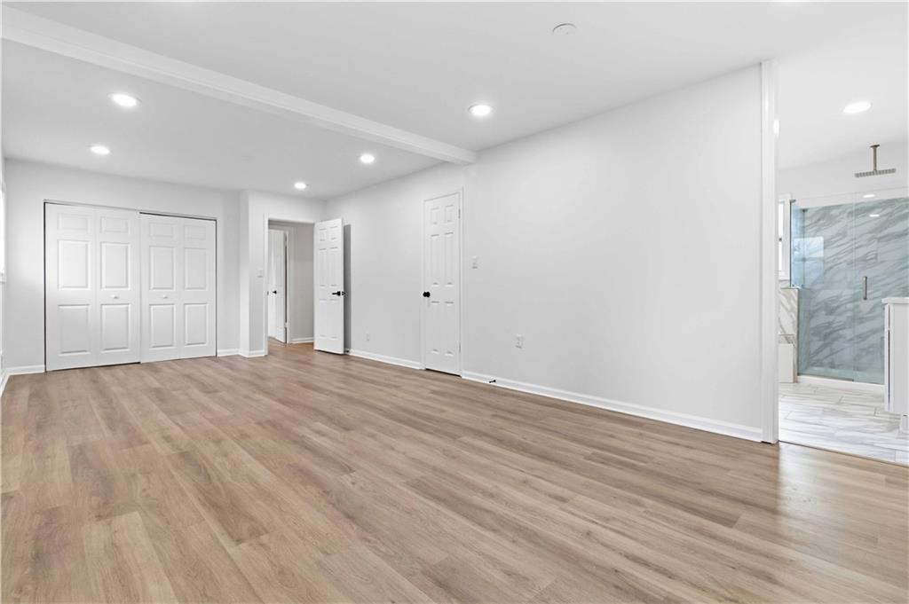 2275 Country Club Lane Southwest Atlanta, GA 30311 - Photo 17 of 32 a view of empty room with wooden floor