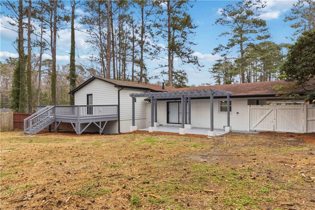 2275 Country Club Lane Southwest Atlanta, GA 30311 - Photo 29 of 32 a view of a house with a yard