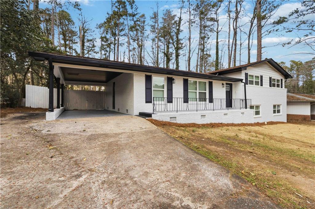 2275 Country Club Lane Southwest Atlanta, GA 30311 - Photo 3 of 32 a house view with a outdoor space