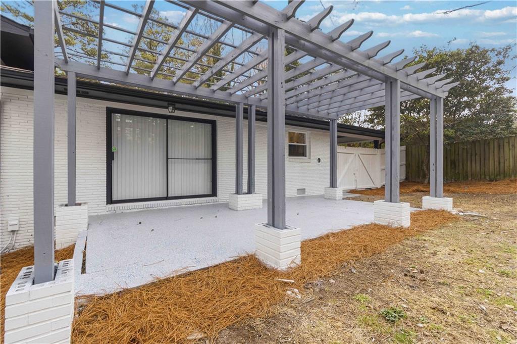 2275 Country Club Lane Southwest Atlanta, GA 30311 - Photo 32 of 32 a view of a house with a snow in the yard