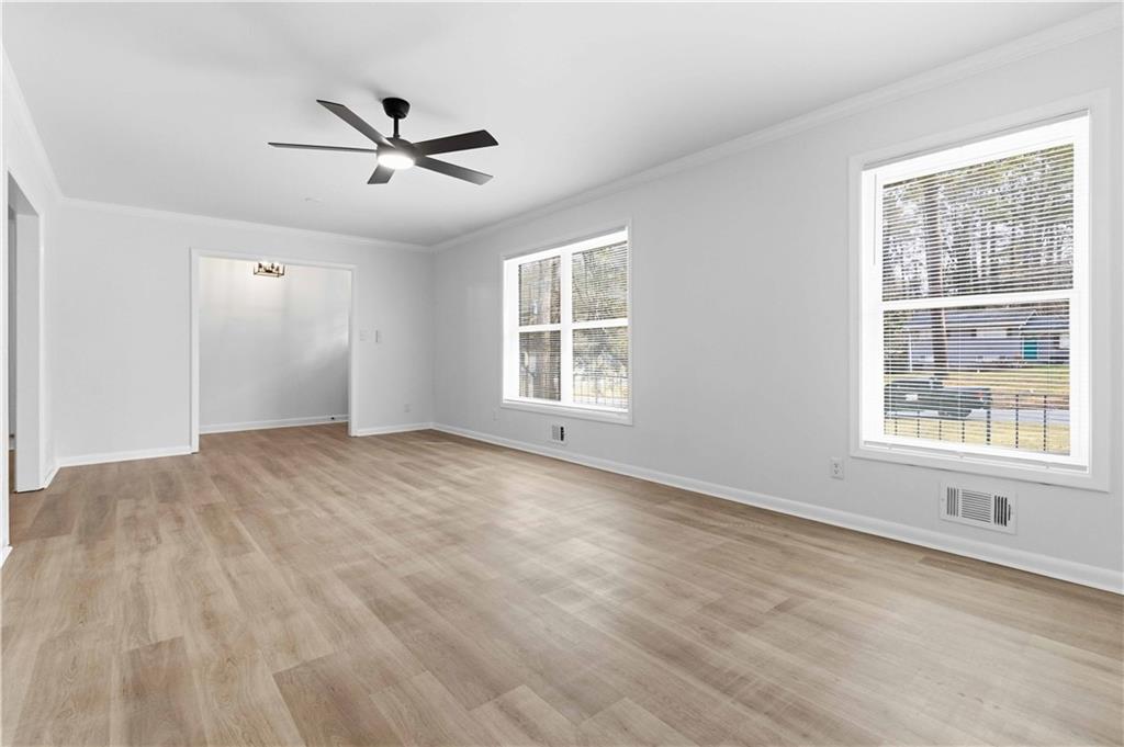 2275 Country Club Lane Southwest Atlanta, GA 30311 - Photo 7 of 32 a view of an empty room with a window
