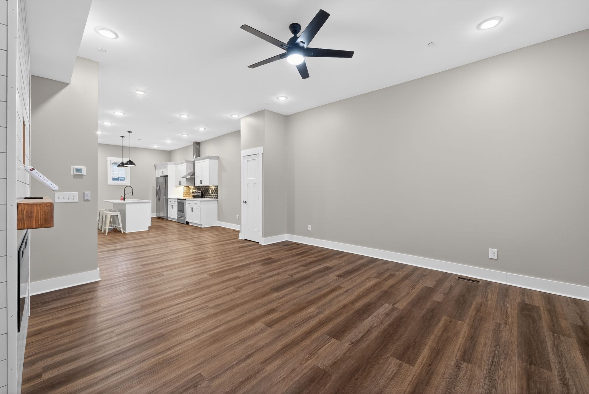 424 Centre Street Pleasant View, TN 37146 - Photo 21 of 36 a view of empty room with wooden floor and ceiling fan