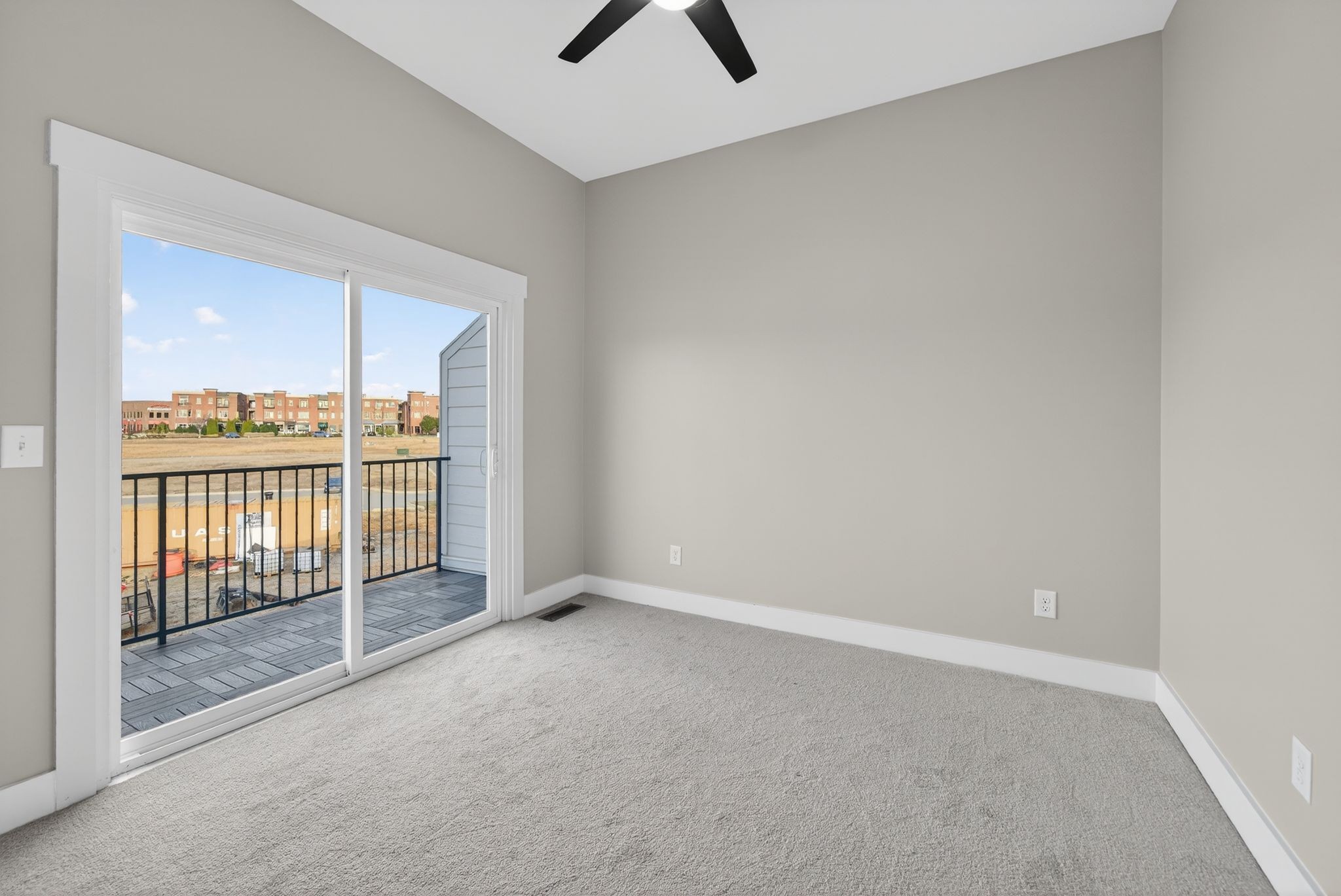 424 Centre Street Pleasant View, TN 37146 - Photo 26 of 36 an empty room with sliding door