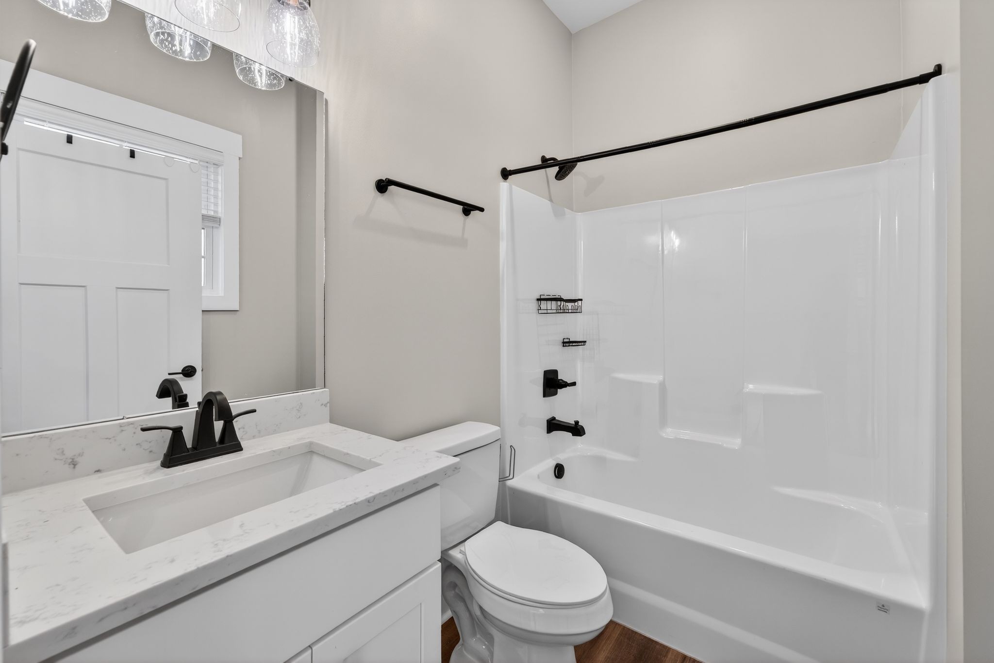 424 Centre Street Pleasant View, TN 37146 - Photo 30 of 36 a bathroom with a sink mirror toilet and bathtub