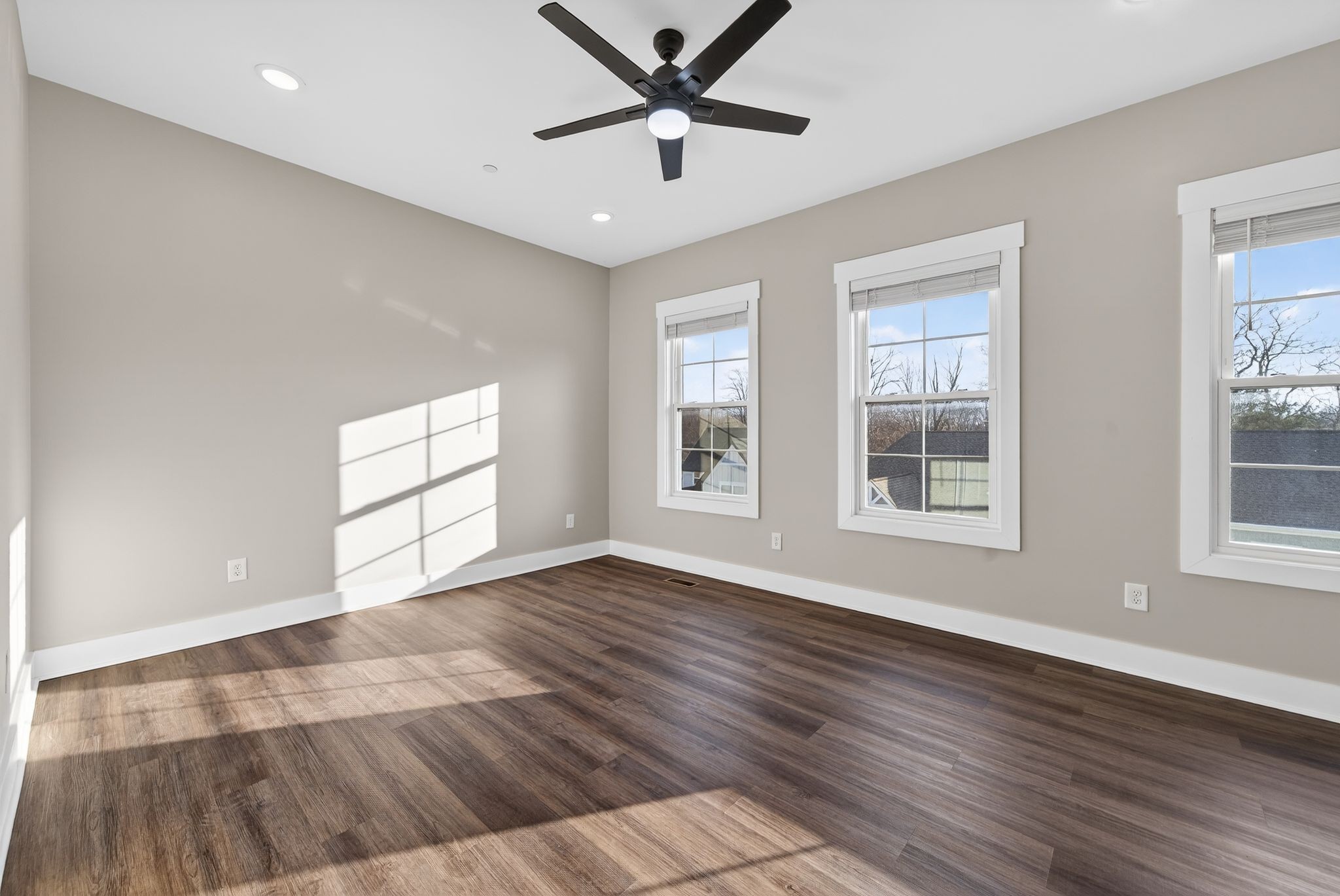 424 Centre Street Pleasant View, TN 37146 - Photo 33 of 36 a view of an empty room with wooden floor and a window