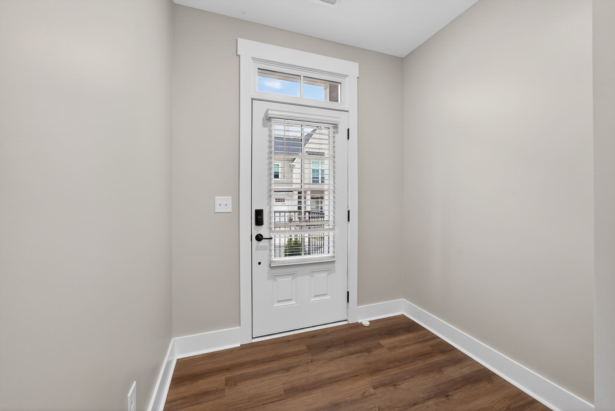 424 Centre Street Pleasant View, TN 37146 - Photo 5 of 36 a view of an empty room with wooden floor and a window