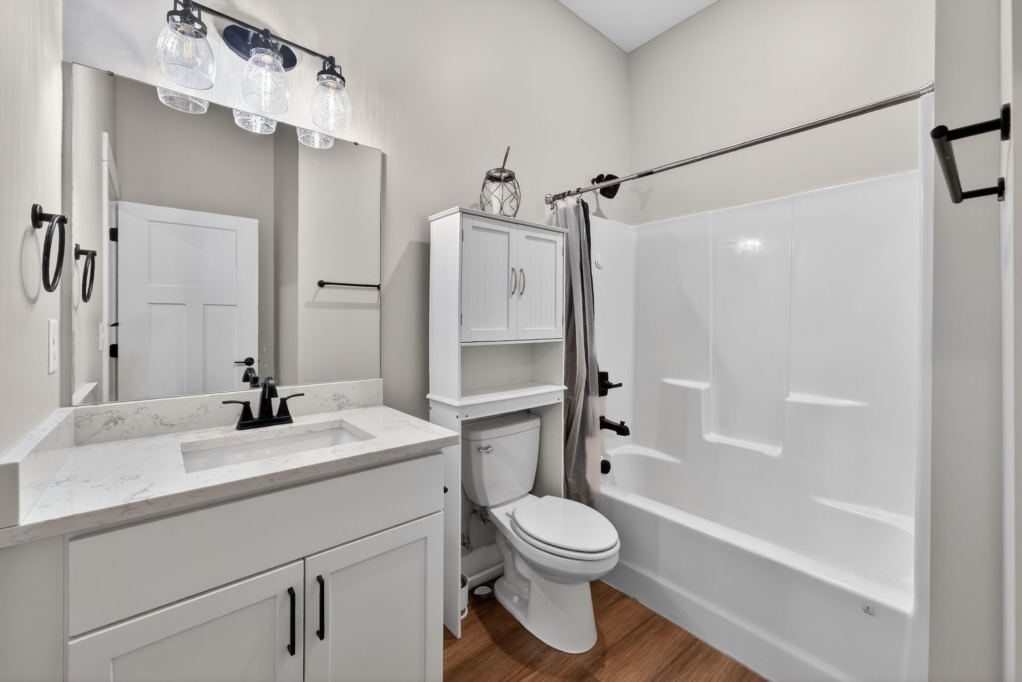 424 Centre Street Pleasant View, TN 37146 - Photo 7 of 36 a bathroom with a sink a toilet and shower