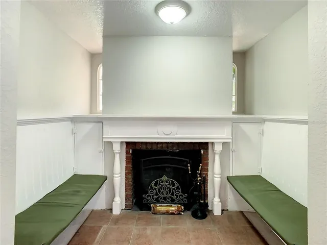 a kitchen with a stove and a microwave