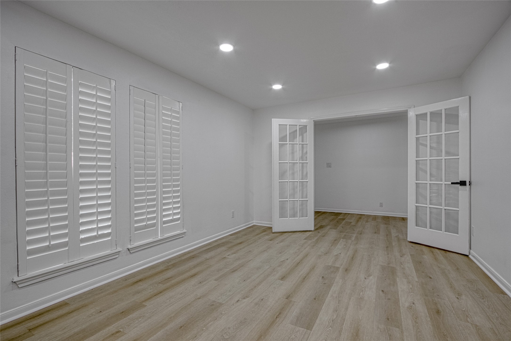 9211 Godstone Lane Spring, TX 77379 - Photo 14 of 30 wooden floor in an empty room with a window