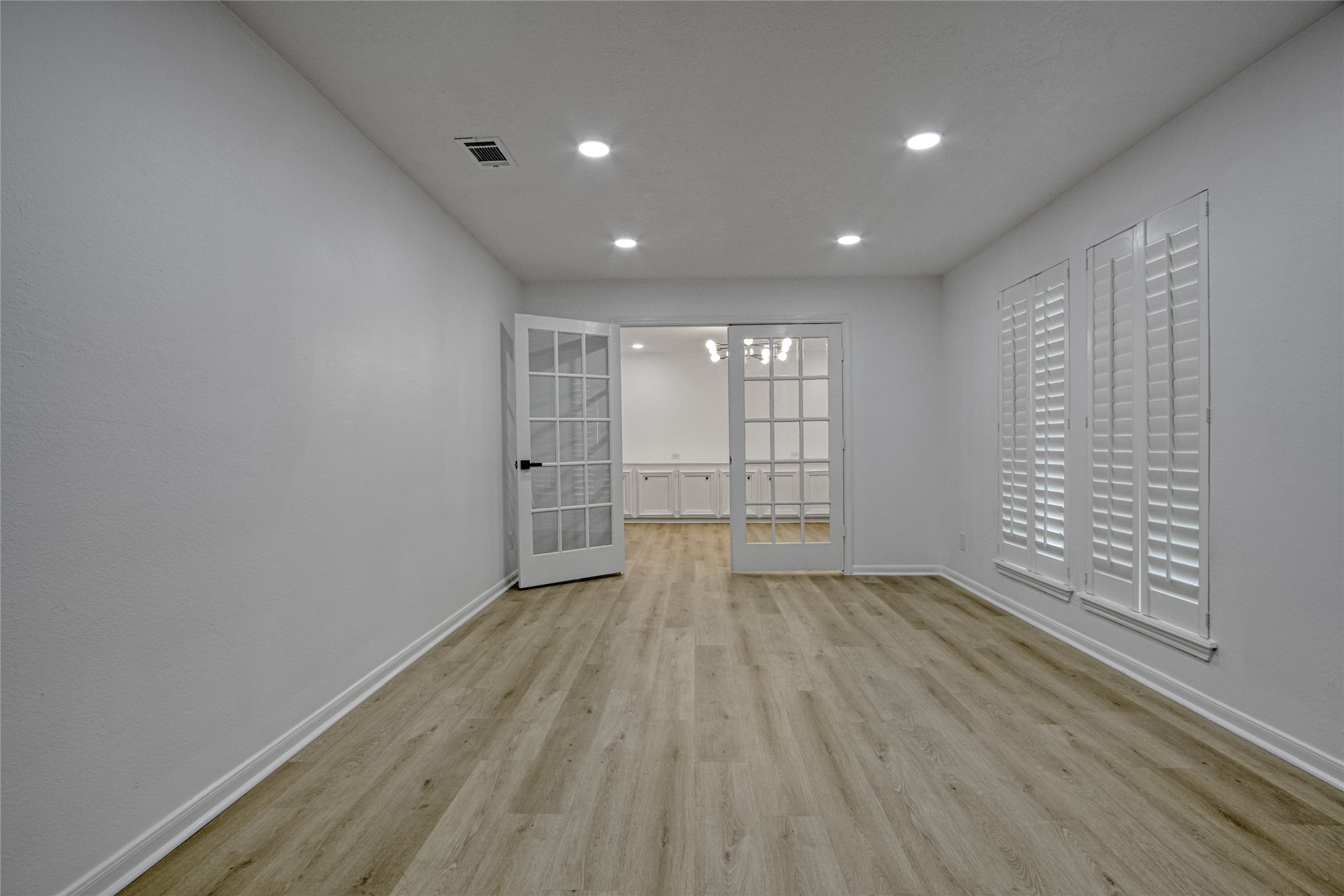 9211 Godstone Lane Spring, TX 77379 - Photo 15 of 30 wooden floor in an empty room with a window