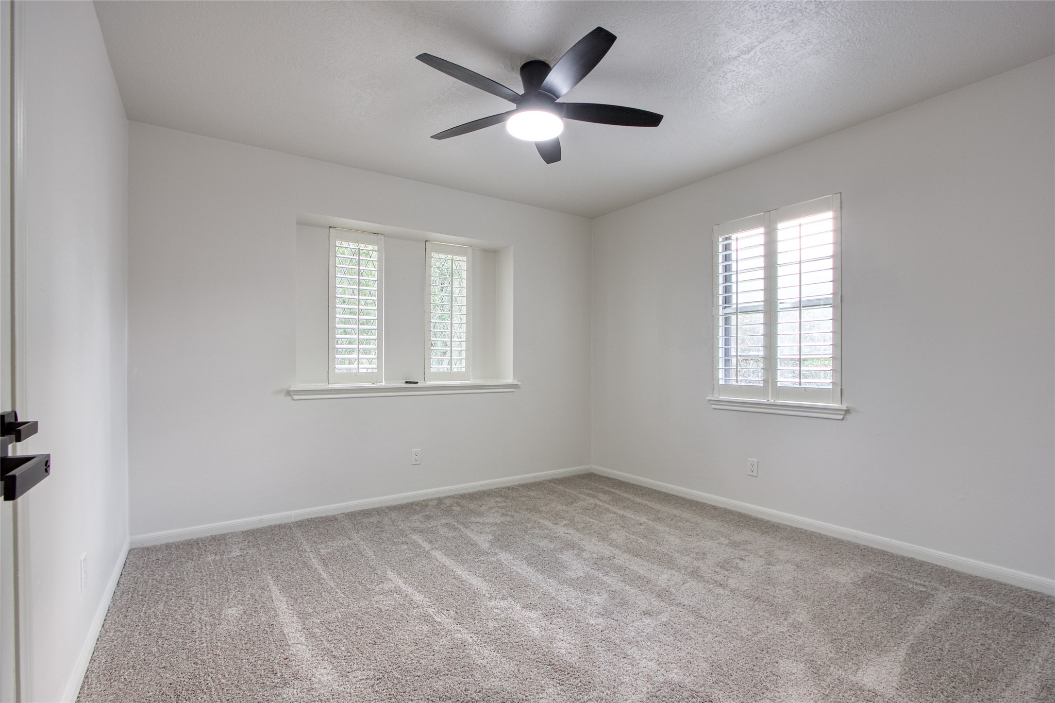 9211 Godstone Lane Spring, TX 77379 - Photo 21 of 30 a view of an empty room with a window