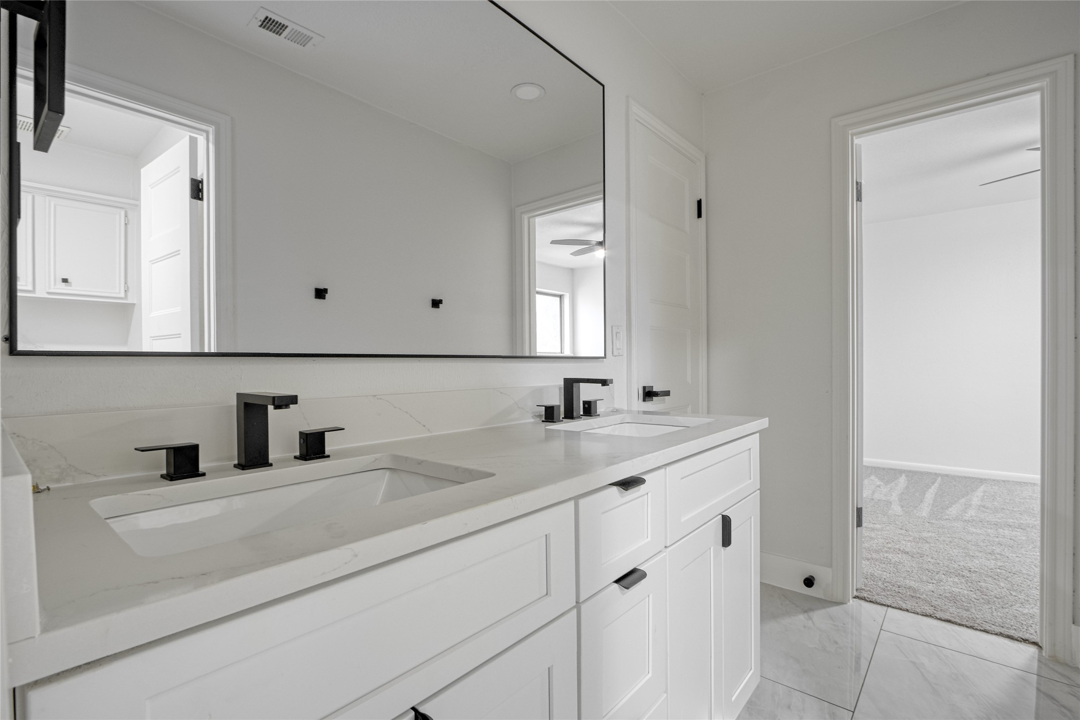 9211 Godstone Lane Spring, TX 77379 - Photo 23 of 30 a bathroom with a sink and mirror