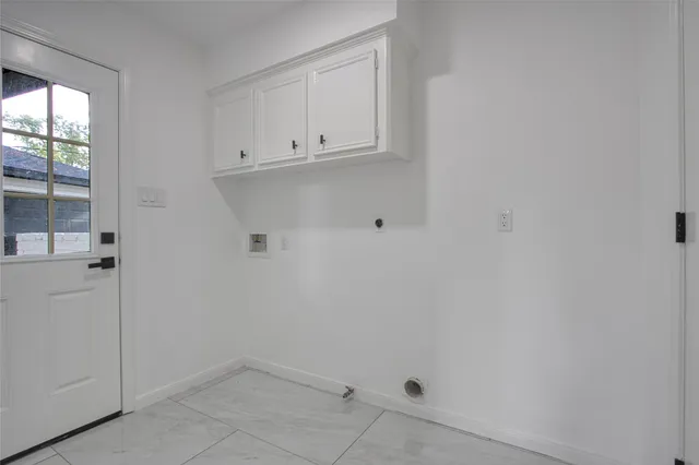 a view of cabinets and window