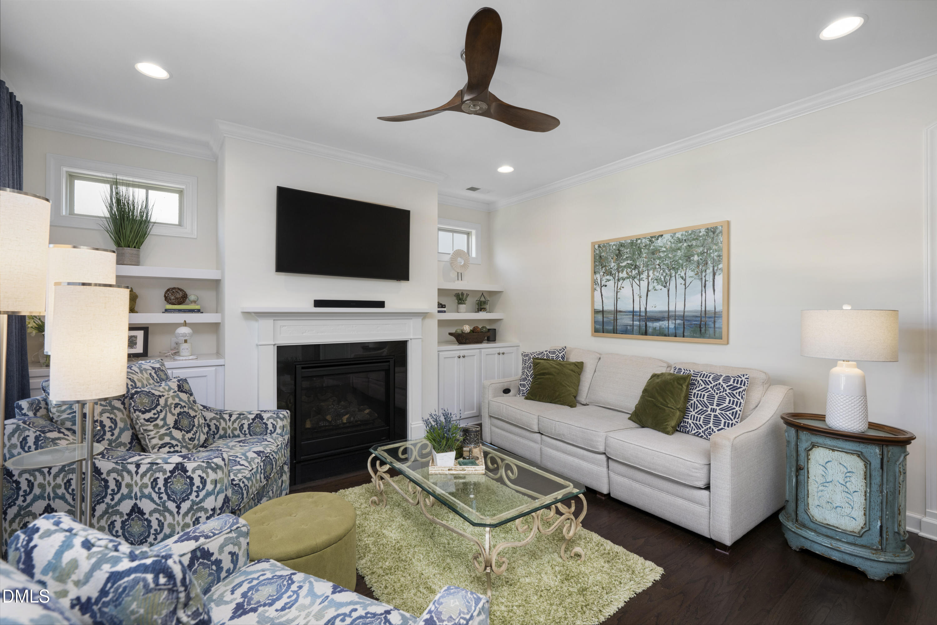 1345 Provision Place Wake Forest, NC 27587 - Photo 16 of 72 a living room with furniture a fireplace and a flat screen tv