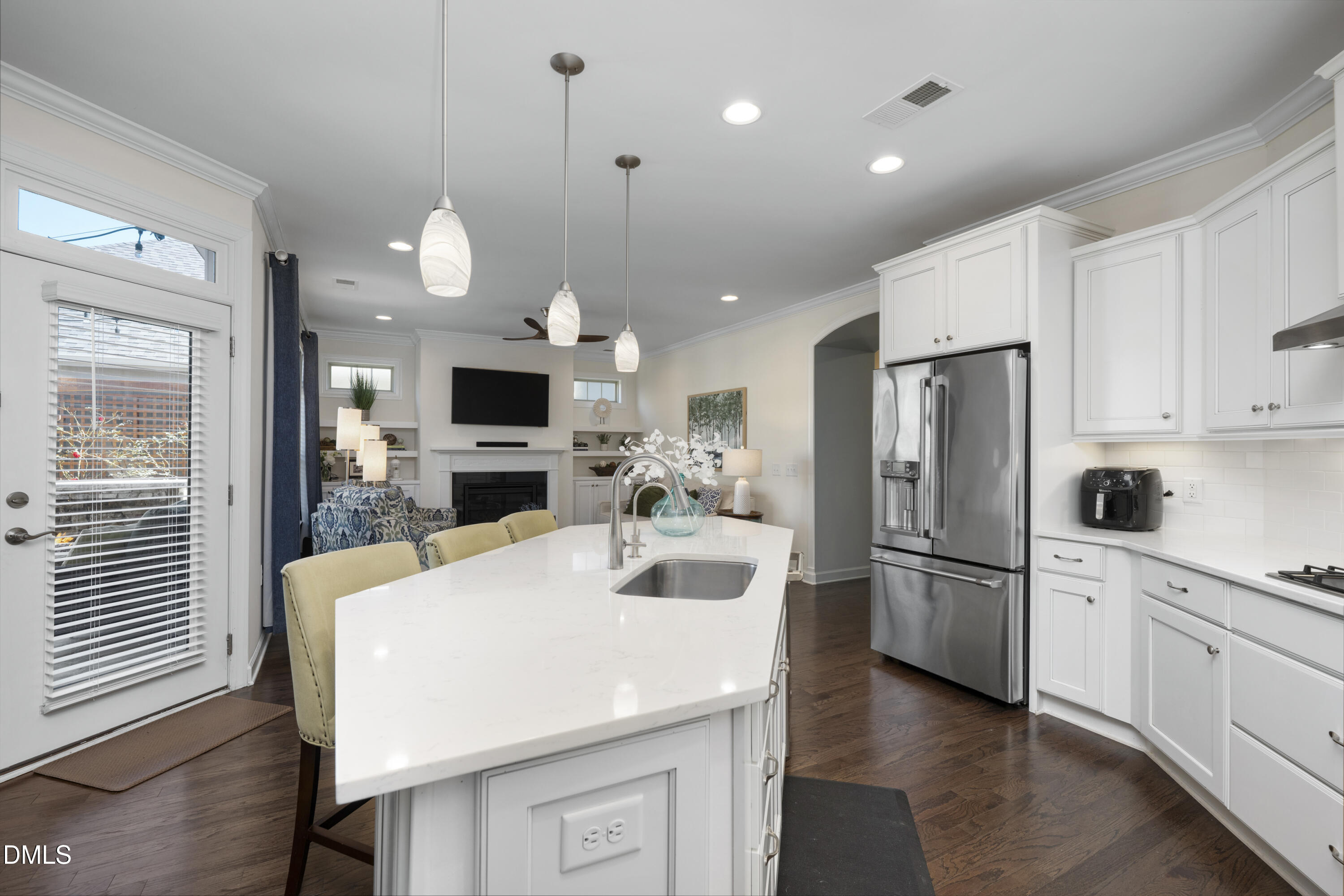 1345 Provision Place Wake Forest, NC 27587 - Photo 22 of 72 a kitchen with stainless steel appliances a stove refrigerator sink and microwave
