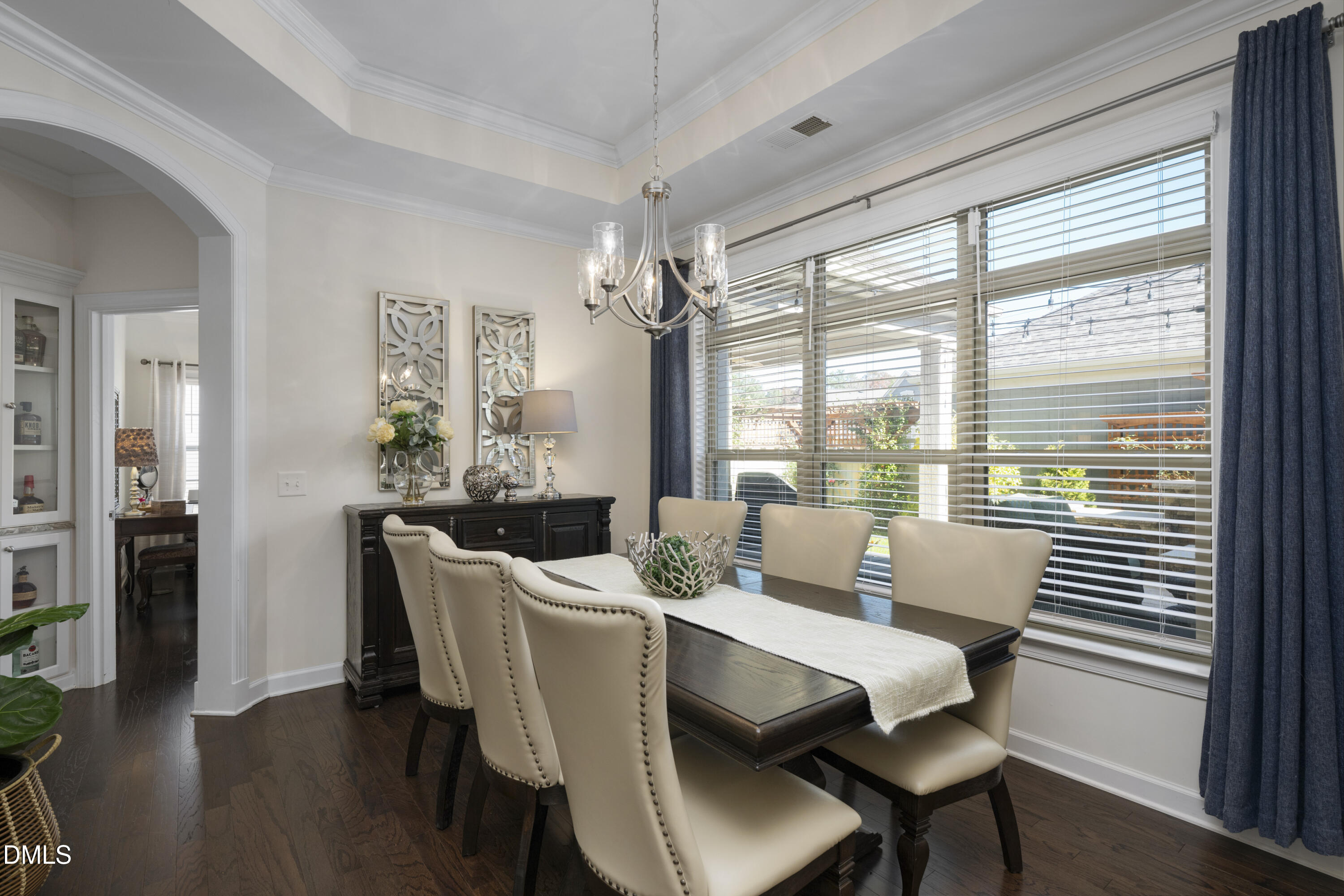 1345 Provision Place Wake Forest, NC 27587 - Photo 25 of 72 a view of a dining room with furniture window and wooden floor