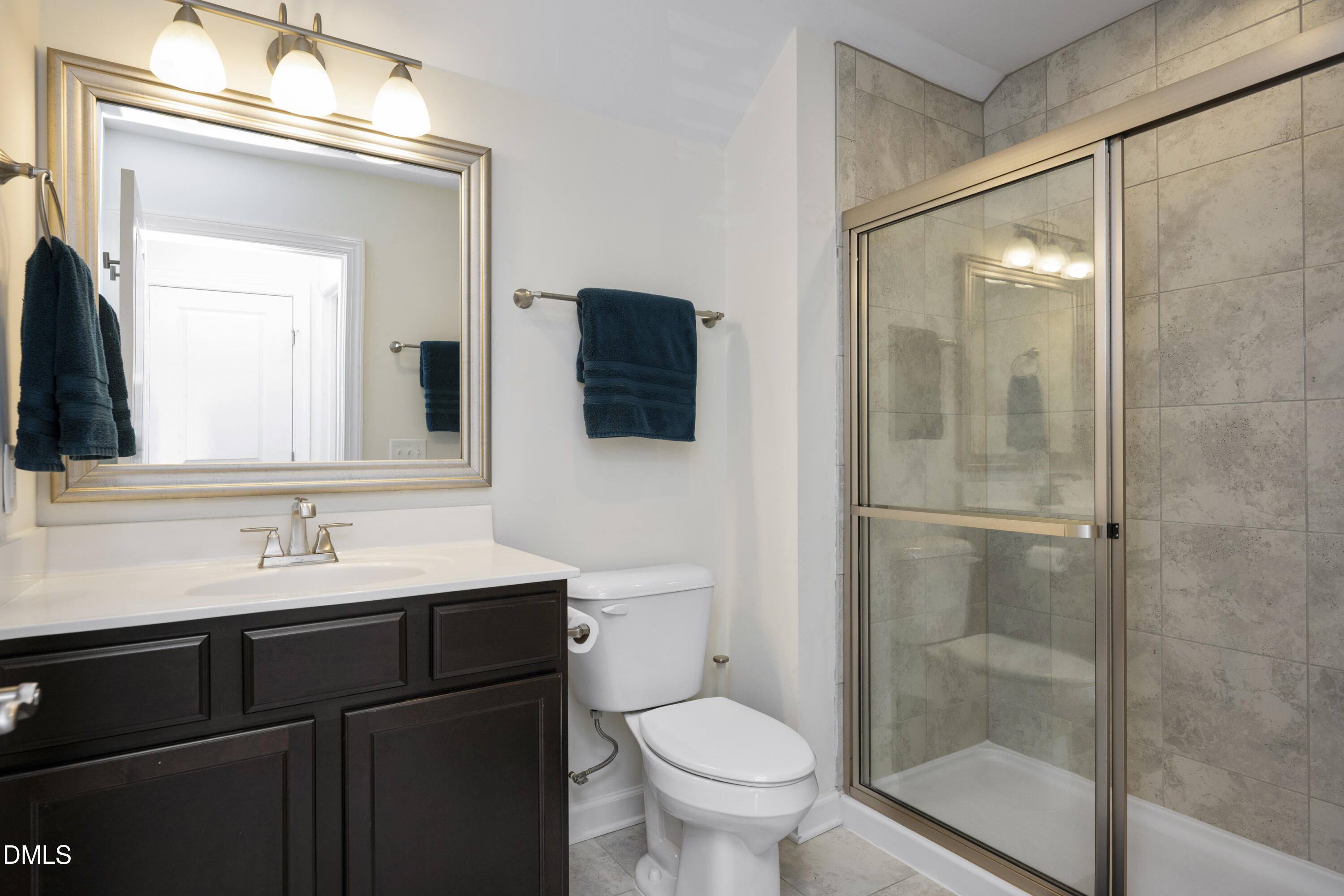 1345 Provision Place Wake Forest, NC 27587 - Photo 35 of 72 a bathroom with a sink and a mirror