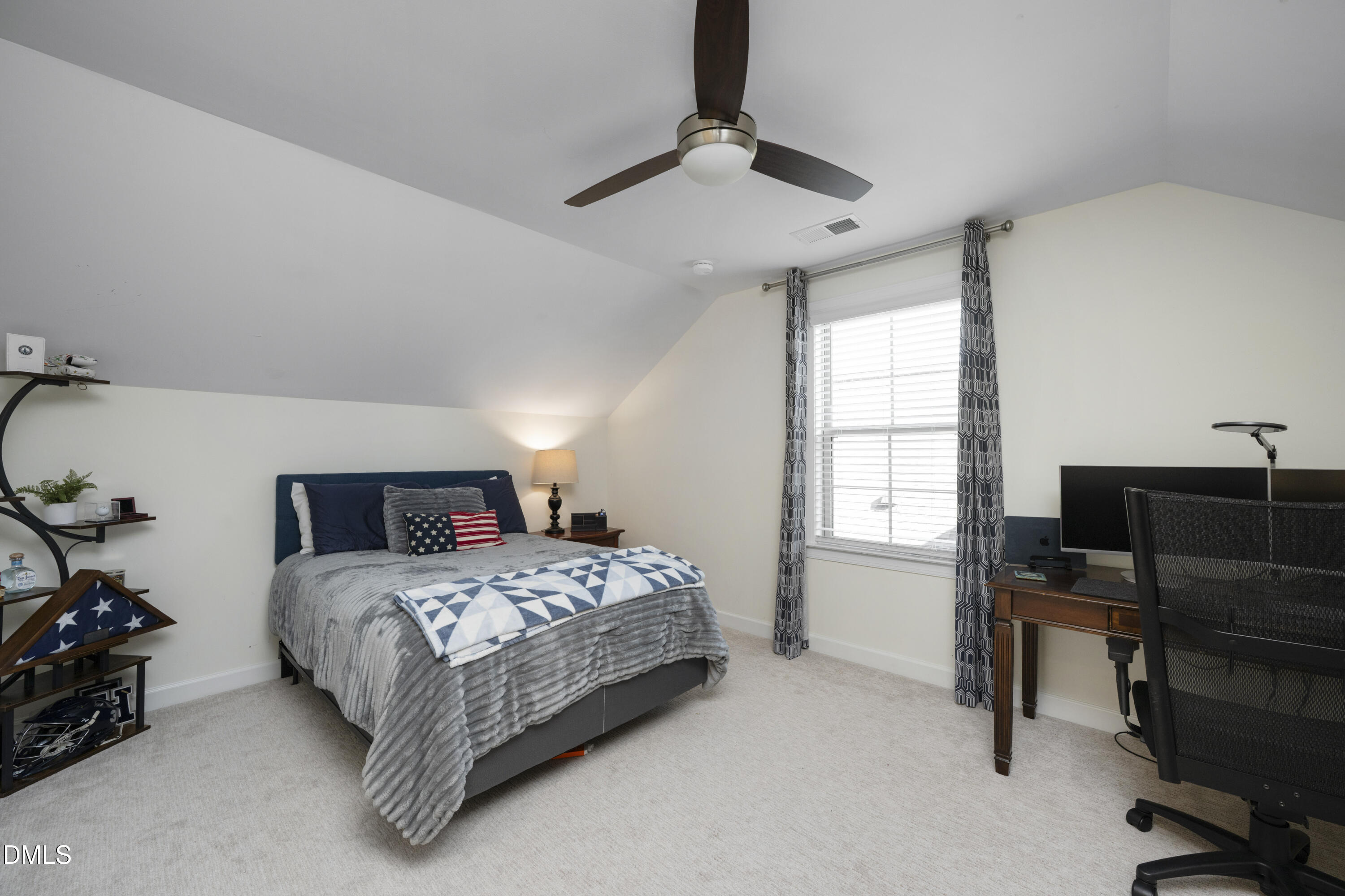 1345 Provision Place Wake Forest, NC 27587 - Photo 36 of 72 a bedroom with a bed and a window