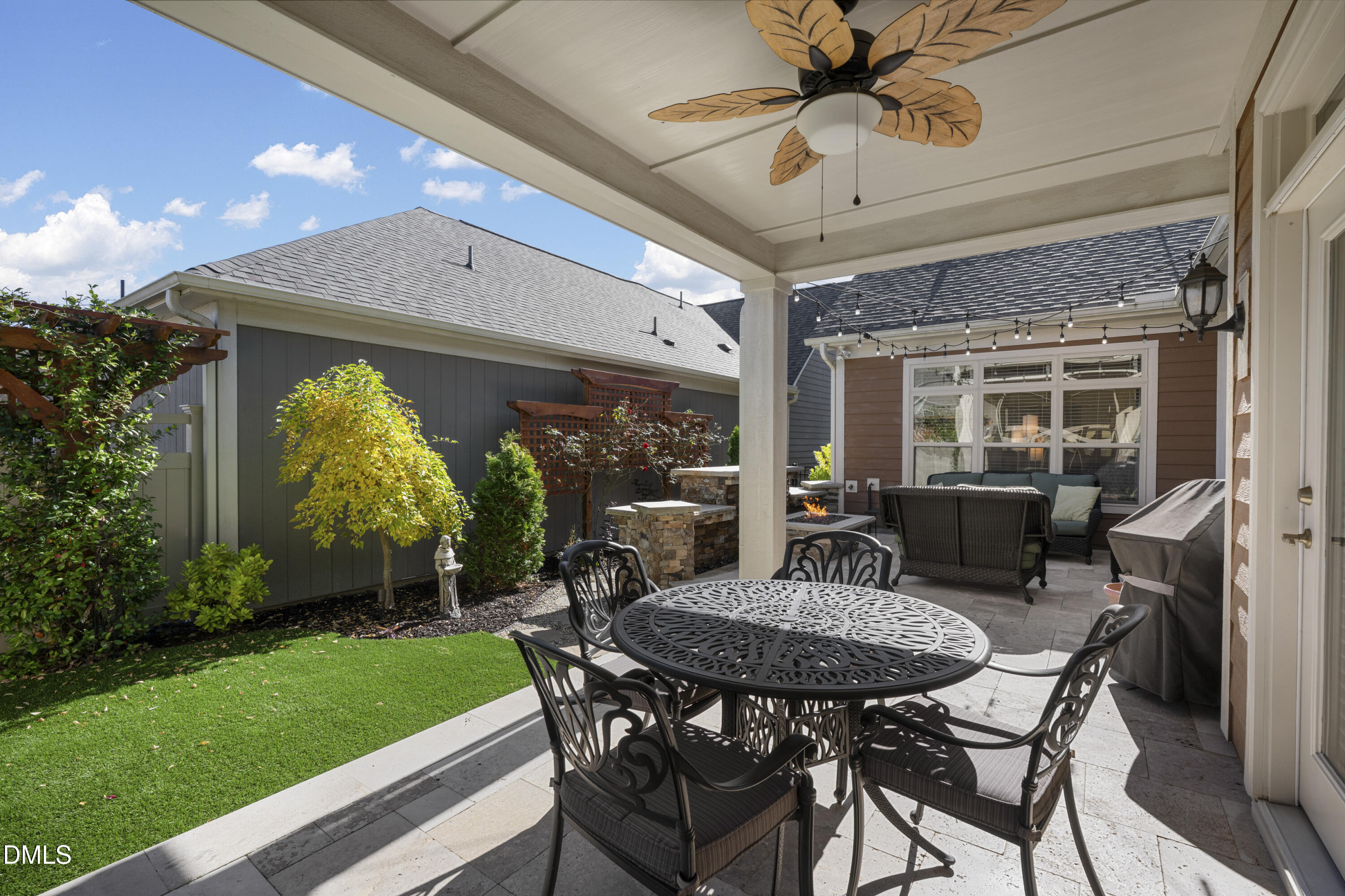 1345 Provision Place Wake Forest, NC 27587 - Photo 42 of 72 a view of a patio with a table and chairs