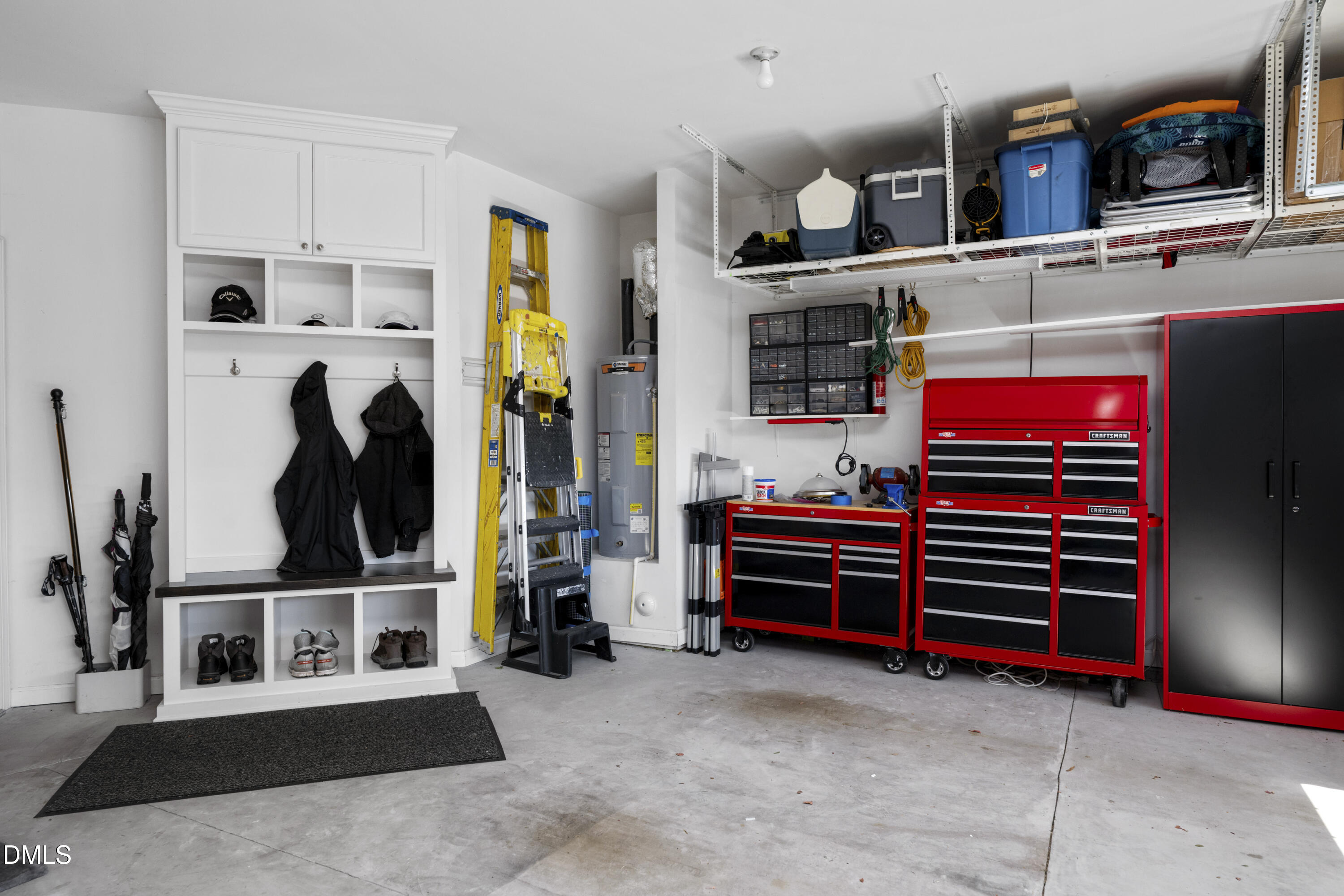 1345 Provision Place Wake Forest, NC 27587 - Photo 55 of 72 a view of walk in closet with clothes and shoes