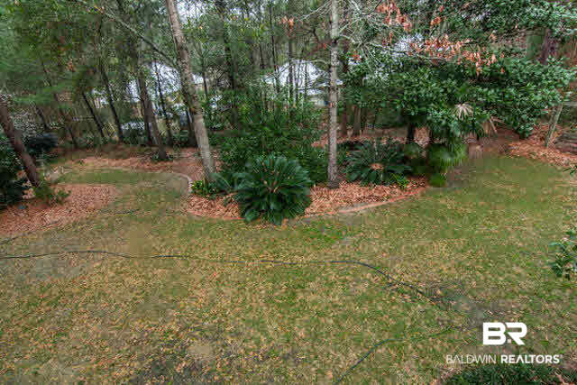 636 Southern Way Daphne, AL 36527 - Photo 33 of 34 Trees include: Satsuma, Asian Pear, Fig, Grapefruit, Persimmon and blueberry bushes
