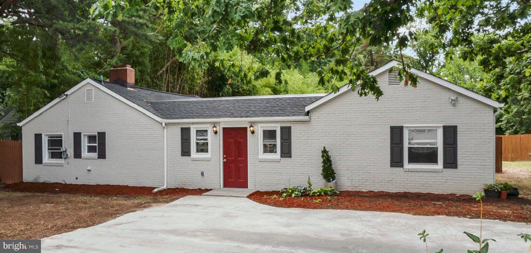 5017 Brinkley Road Temple Hills, MD 20748 - Photo 1 of 22 Front of the House and driway
