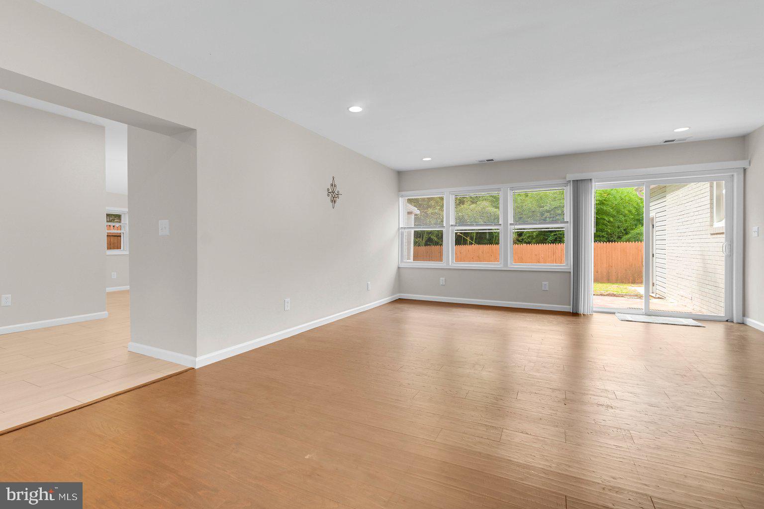 5017 Brinkley Road Temple Hills, MD 20748 - Photo 5 of 22 Living room with panoramic windows