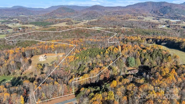 a view of a city with mountains in the background