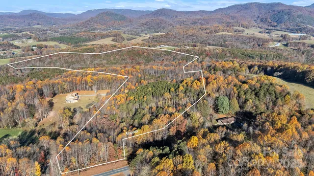 a view of a city with mountains in the background