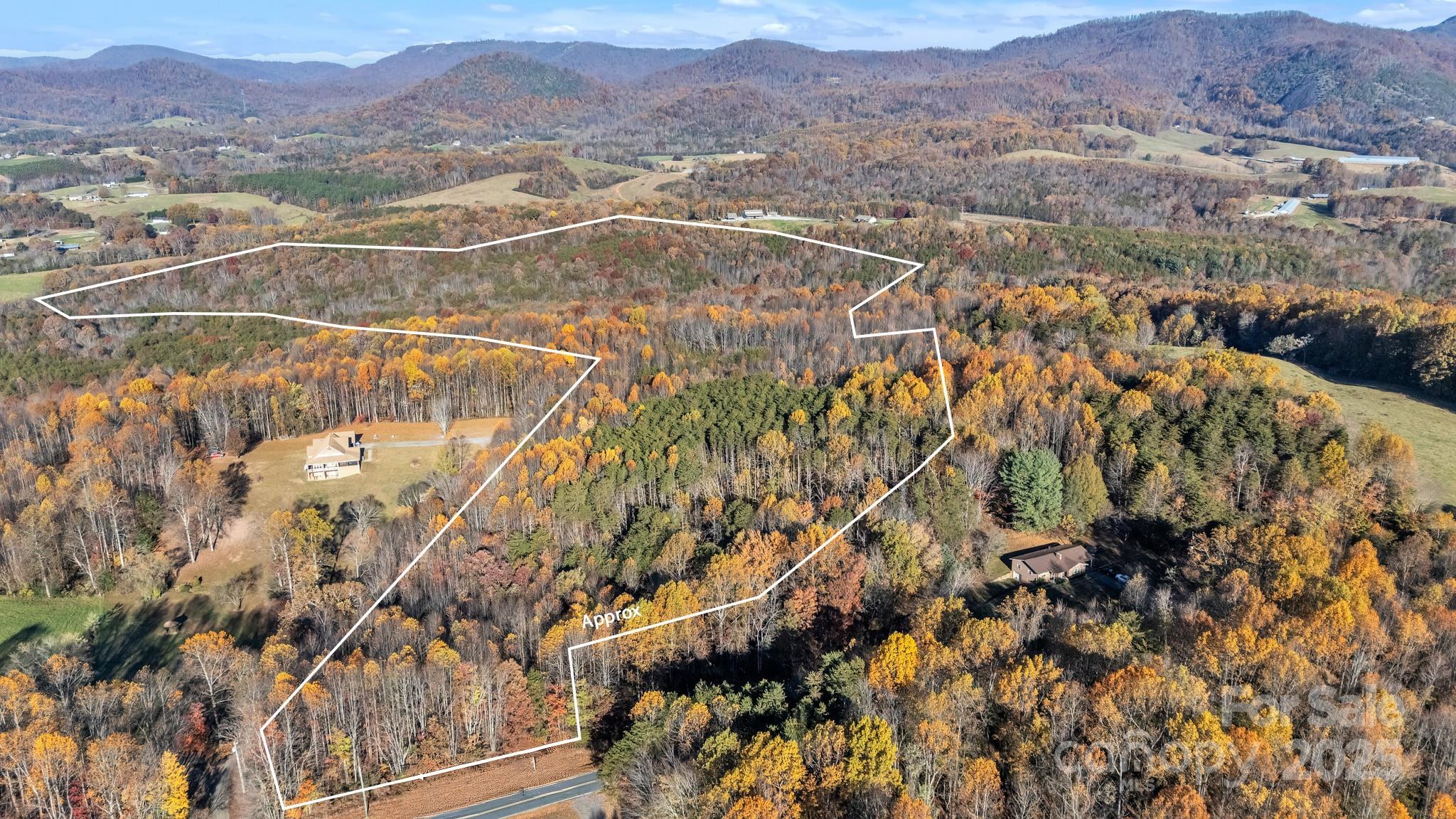 a view of a city with mountains in the background
