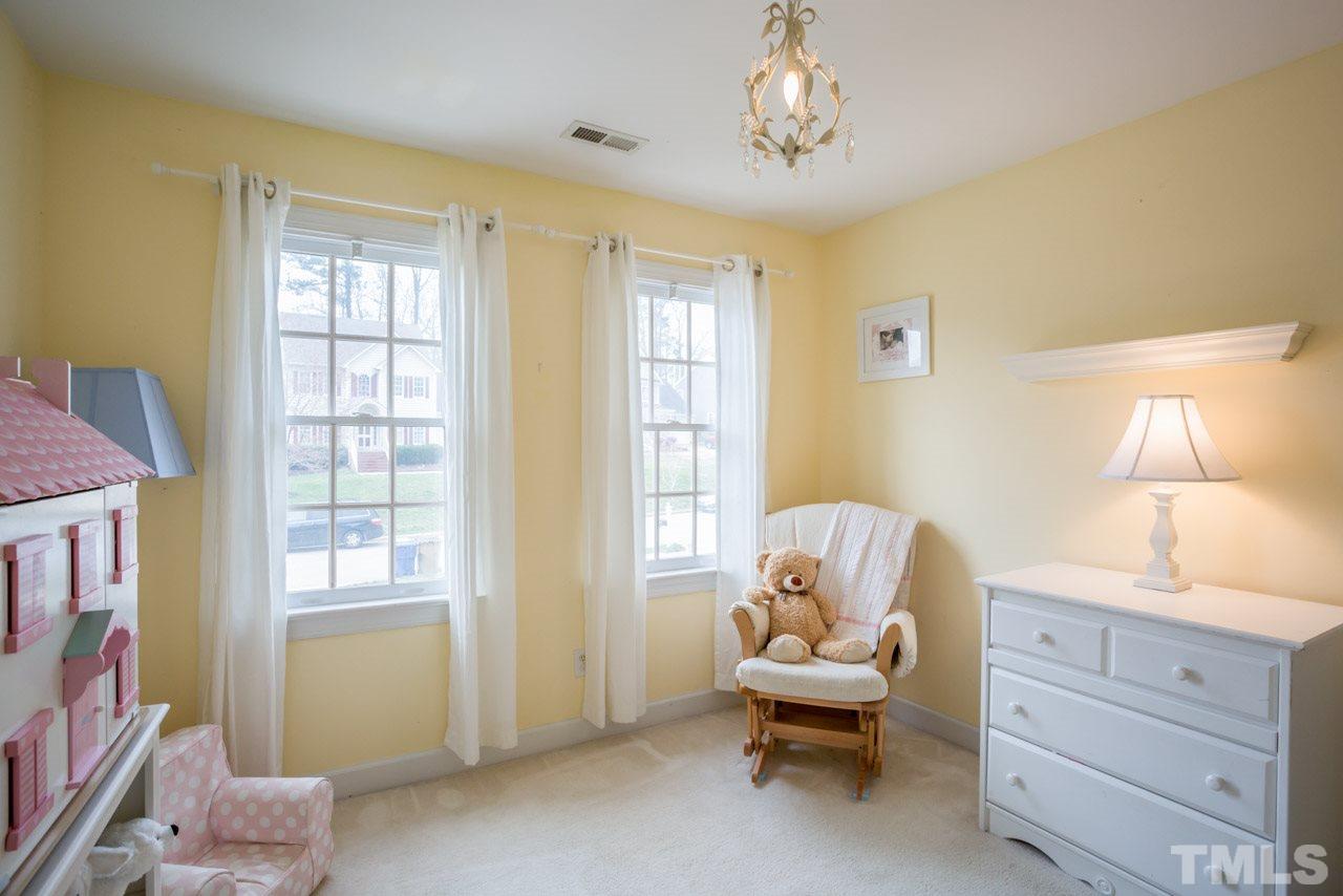 2716 Dahlgreen Road Raleigh, NC 27615 - Photo 18 of 25 a living room with furniture and a window