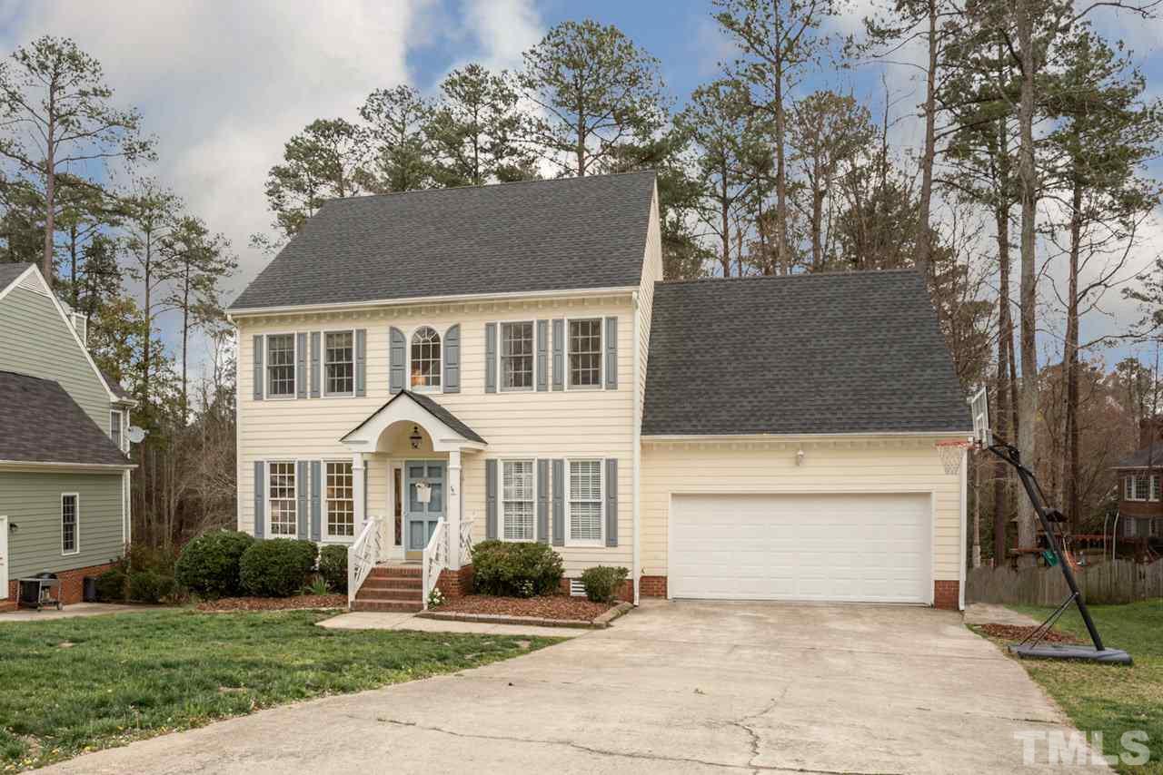 2716 Dahlgreen Road Raleigh, NC 27615 - Photo 3 of 25 a front view of a house with a yard and garage