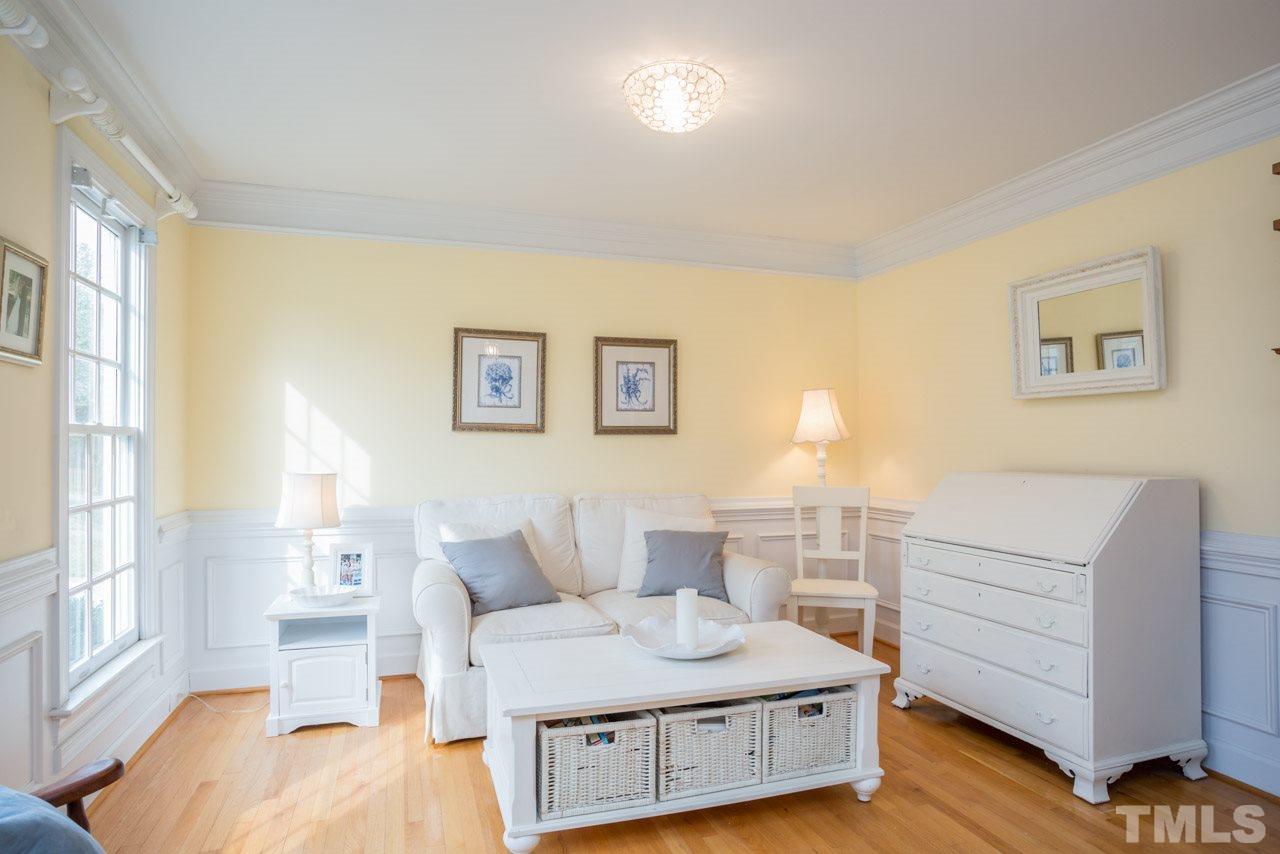 2716 Dahlgreen Road Raleigh, NC 27615 - Photo 5 of 25 a living room with furniture and a table