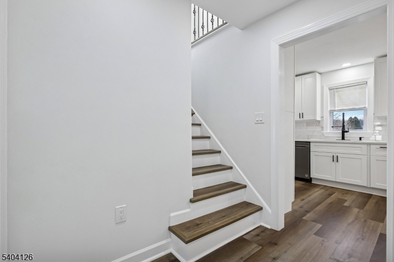 85 Madison Street Newton, NJ 07860 - Photo 24 of 45 a view of entryway and hall with wooden floor