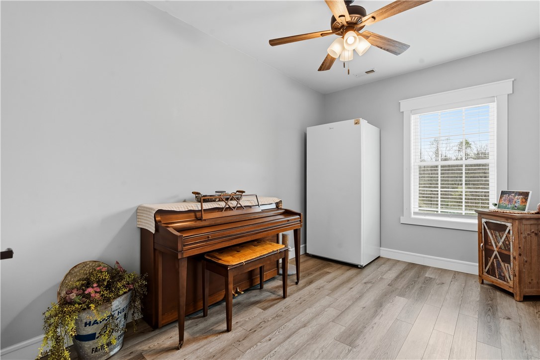 1158 Pyle Road Clarksville, OH 45113 - Photo 53 of 76 This versatile room features durable flooring and a bright window, ideal for various uses.
