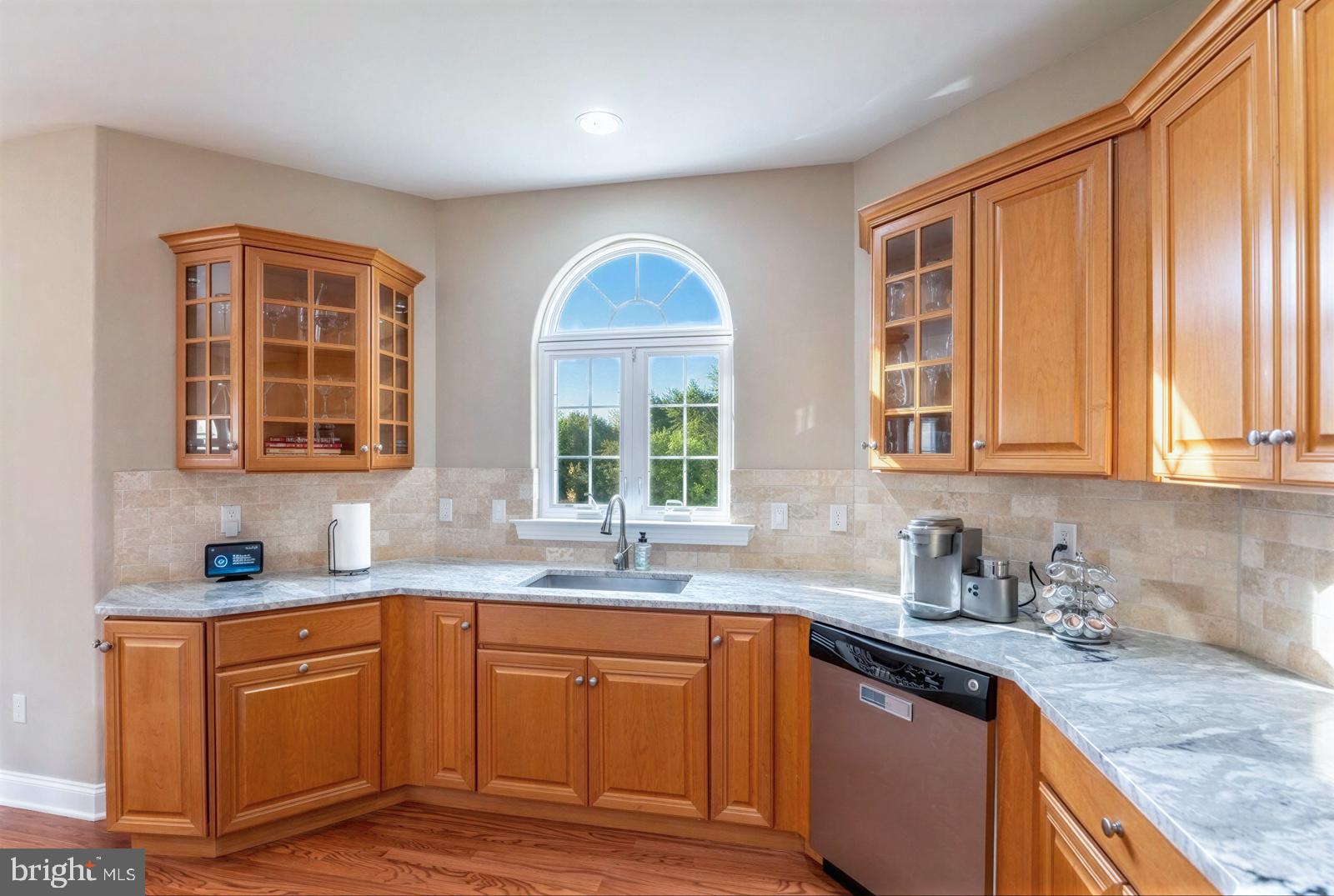 13 Maack Road Pottstown, PA 19465 - Photo 16 of 65 Sunlit kitchen with warm wood accents.