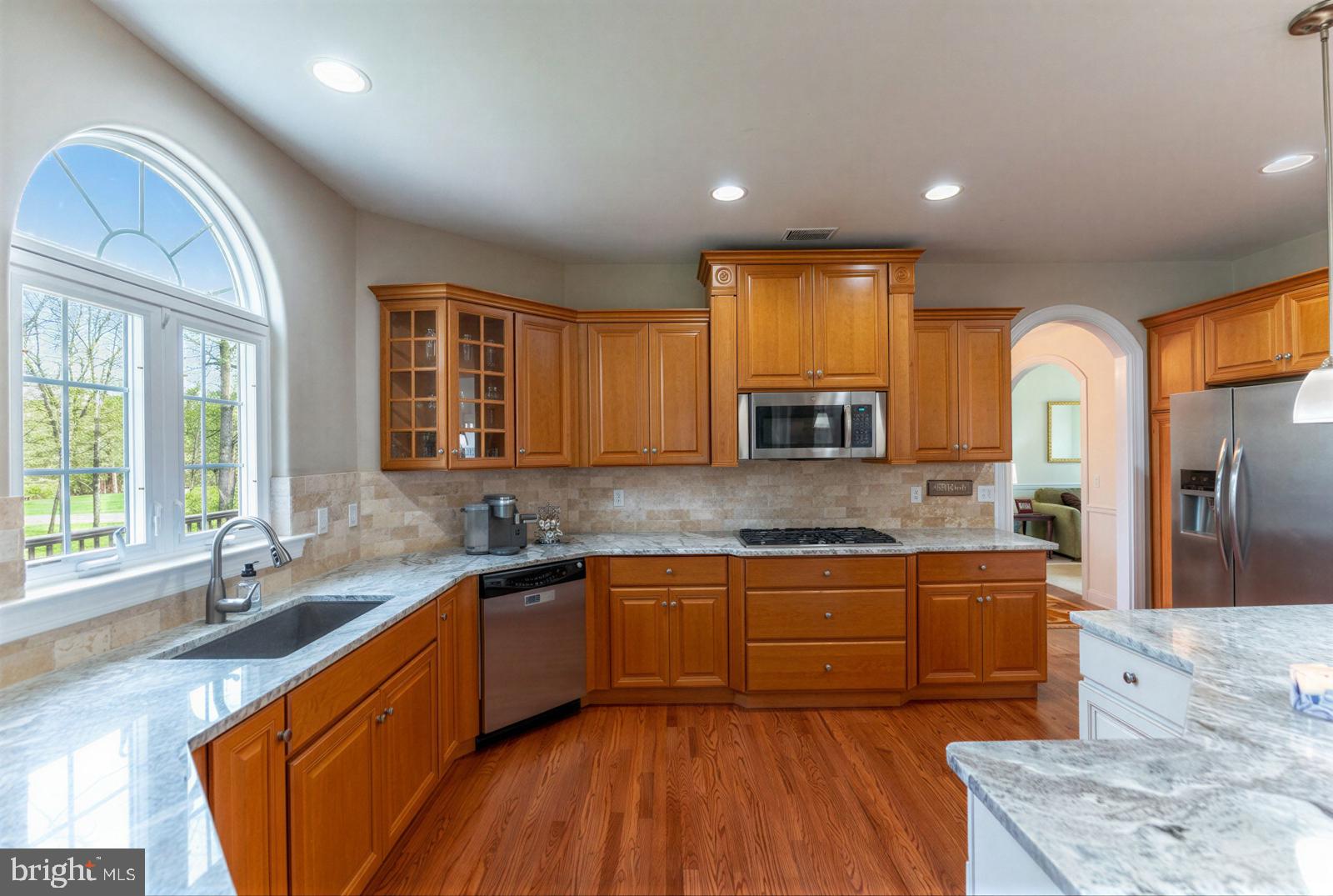 13 Maack Road Pottstown, PA 19465 - Photo 17 of 65 Elegant kitchen with warm wood tones.