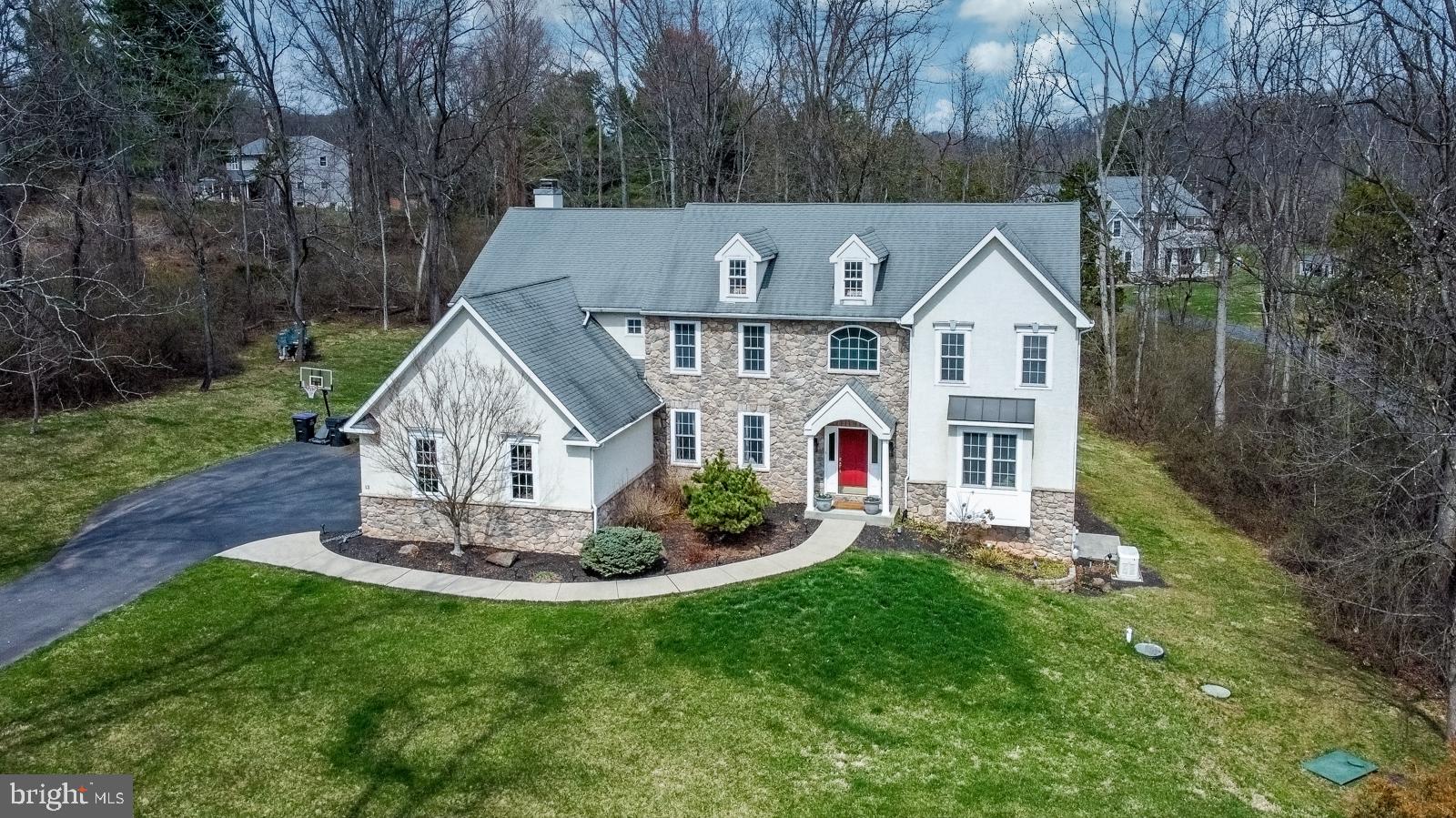 13 Maack Road Pottstown, PA 19465 - Photo 59 of 65 Drone shot - nestled in nature's embrace.