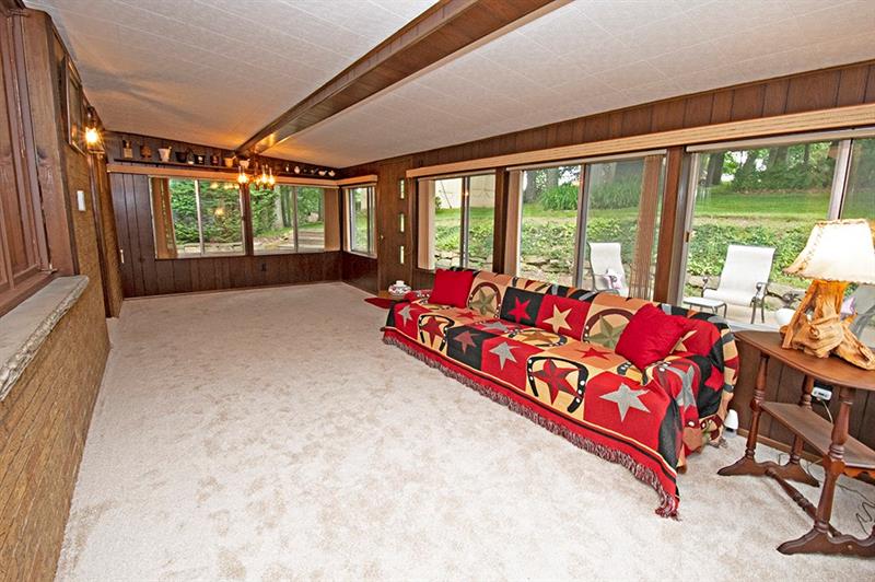 133 Dutchtown Road Butler, PA 16002 - Photo 14 of 25 Step into the sunroom surrounded by a wall of windows..
