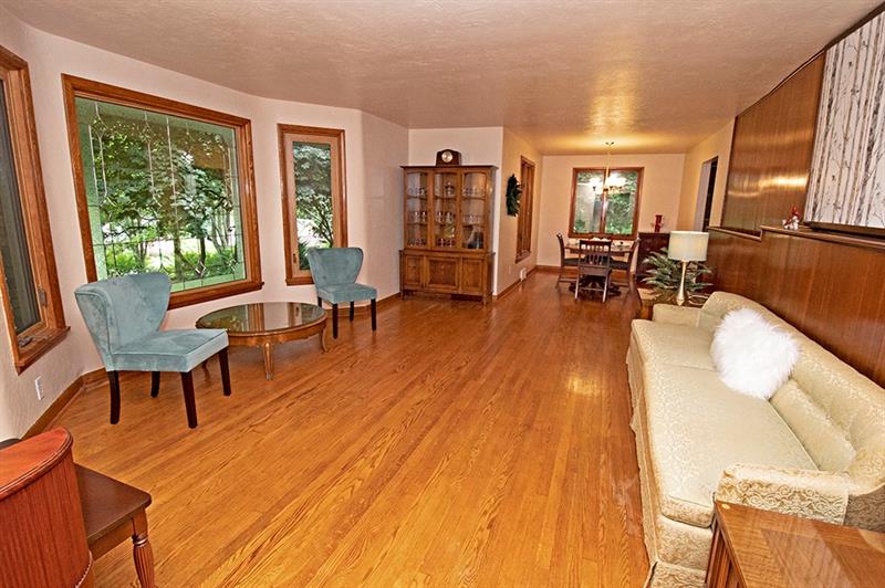 133 Dutchtown Road Butler, PA 16002 - Photo 3 of 25 Living room features wood floors and leaded glass picture window.