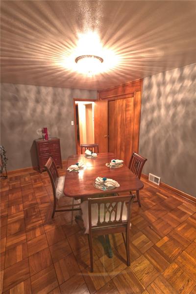 133 Dutchtown Road Butler, PA 16002 - Photo 7 of 25 Dramatic dining room with parquet floors.