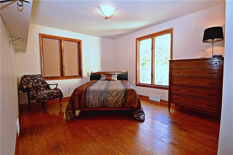 133 Dutchtown Road Butler, PA 16002 - Photo 9 of 25 This bedroom looks over the front yard and has wood floors.