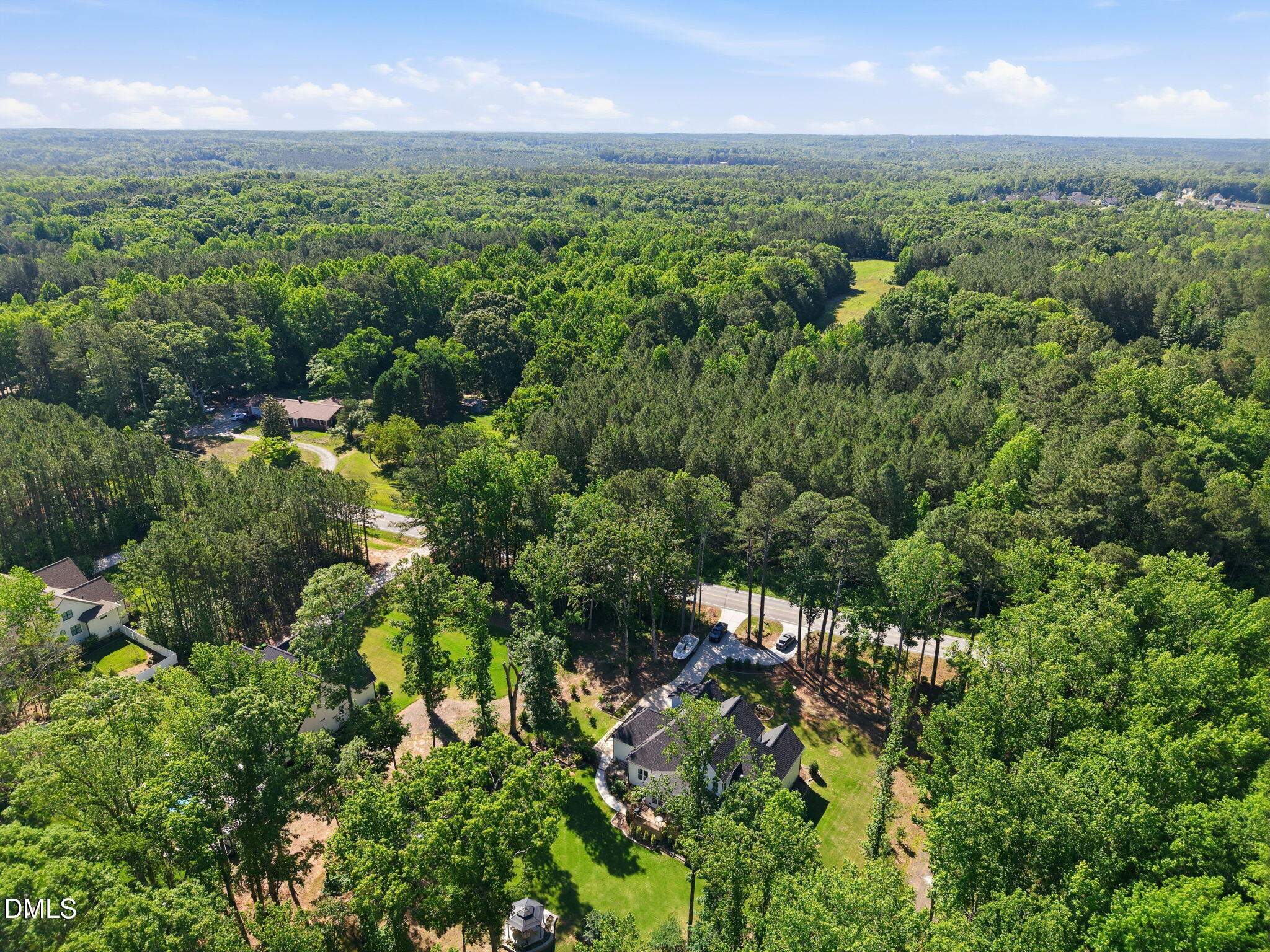 3511 Bruce Garner Road Wake Forest, NC 27587 - Photo 42 of 56 an aerial view of a city with lots of residential buildings in green space