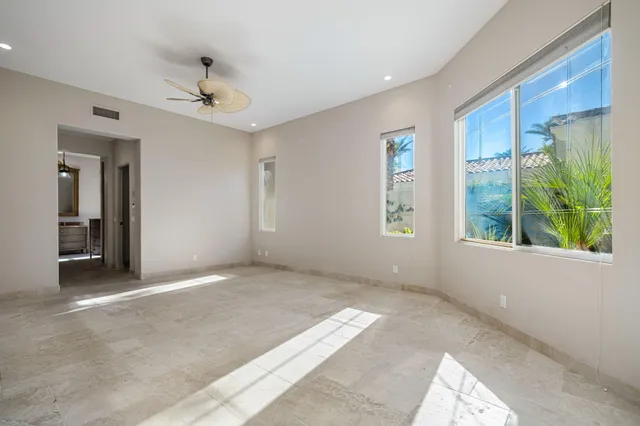 an empty room with windows