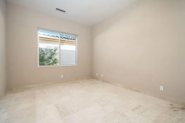 a view of a back yard of the house