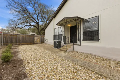a house with trees in front of it