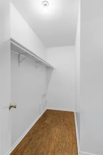 a view of a room with racks on the wall